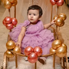 A perfect portrait from a first birthday party. I focus on getting those sweet expressions as your child interacts with the decorations and enjoys their special day.