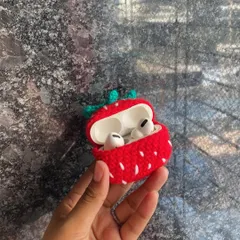 Protect your tech with a touch of handmade cuteness. This is a custom-made crochet strawberry case designed to perfectly fit AirPods.