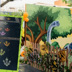We create an adventurous atmosphere with details like dinosaur footprint decals and a rustic fence, making kids feel like they're entering Jurassic Park.