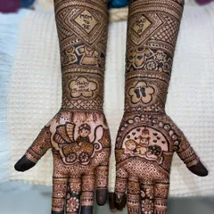 A detailed maternity mehandi with "Mom to be" and "Dad to be" messages. The palms feature a baby in a pram and a sleeping baby, with "Baby on Board" written on the arm.