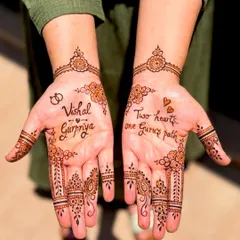 For Gurpriya's engagement, I created this personalized design incorporating the couple's names and the heartfelt quote, "Two hearts, one Guru's path," surrounded by delicate floral details.