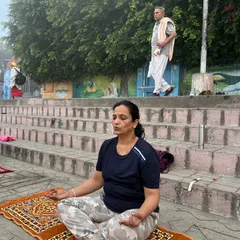 A student meditating during our Haridwar yoga retreat. The peaceful, misty atmosphere is perfect for turning inward.