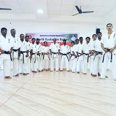 The senior black belt group at a training camp. These advanced sessions are for our most dedicated students to deepen their knowledge.