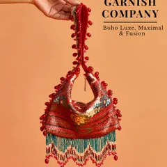 Embrace a boho-luxe vibe with this maximalist and fusion bag from The Garnish Company. The beadwork and fringe details make it a true statement piece for a mehendi or sangeet.