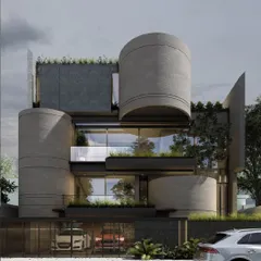 I designed this residence as a composition of bold, interlocking forms. The cylindrical concrete volumes create a powerful sculptural statement, softened by integrated planters and rooftop greenery that introduce a biophilic element to the modern facade.