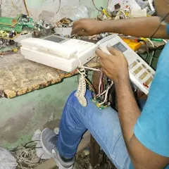 I don't just install systems, I also provide full repair services. This is my workshop where I perform detailed, circuit-level repairs on video door phones and other security devices. You can trust that I will support you even after the installation is done.