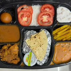 For festivals like Karwa Chauth, I prepare special, complete meal thalis. This plate includes two sabzis, dal, rice, raita, papad, and a sweet, all carefully packed to make your celebration feel both special and effortless.