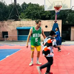 A visiting French coach working one-on-one with our young players. These global exchange opportunities are invaluable for their growth and exposure to different coaching styles.