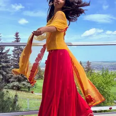 Another shot from a beautiful outdoor photoshoot. The wind, the sky, and the movement all coming together in one perfect moment.