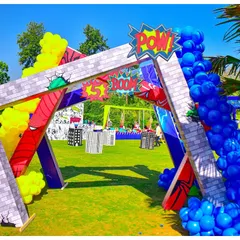 I designed this explosive entrance arch to make kids feel like they were bursting into a comic book. The 'POW!' sign, crumbling brick effect, and colourful balloon clusters set a high-energy tone for the Avengers-themed party.