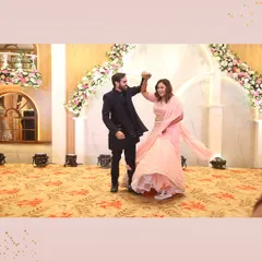 Capturing twirls in the majestic backdrop of magnificent florals, as if dancing in a dream. Our events are a symphony of beauty and love.