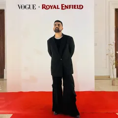 Attending the Vogue India x Royal Enfield collaboration event. For this, I wore an oversized black blazer with wide-leg cargo pants for a look that is both formal and fashion-forward.