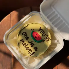 A punny and cute "You're one in a melon!" bento cake. These playful designs are perfect for anniversaries, Valentine's, or just to make someone smile.