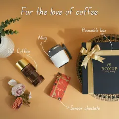 For the love of coffee. This flat lay shows the contents of one of our coffee-themed hampers, including TGL coffee, a mug, and Smoor chocolate, all ready to be packed in a reusable box.