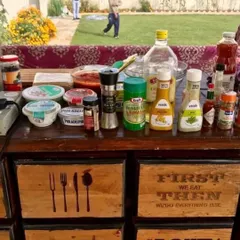 The prep table for a live station at a farm party. I use high-quality ingredients and a variety of sauces and seasonings to create delicious, customized dishes.