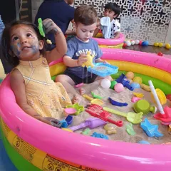 Our indoor sandpit is a huge hit. Filled with colorful toys, it provides a fantastic sensory experience, allowing kids to dig, pour, and build.