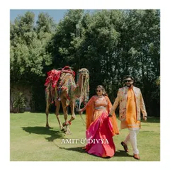A touch of Rajasthani royalty at this Haldi carnival. The couple walking with a decorated camel adds a unique and traditional element to their celebration, which we were excited to capture.