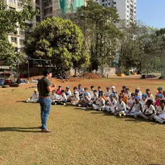 An expert from MentElitey addressing our junior players during a mental skills workshop on the ground. We believe in starting this training early to build resilient athletes.