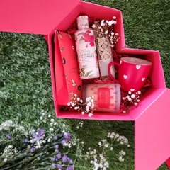 We have a secret. We absolutely love working with our associate Secret Hair Oil. This heart shaped box is filled with their products and other goodies, making it a perfect gift for any occasion.