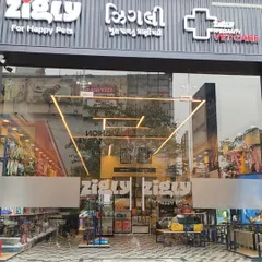 The storefront of our Ahmedabad location, showcasing our modern branding and the integration of retail ("For Happy Pets") and medical services ("Speciality Vet Care").