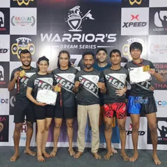 Celebrating three gold medals at the Warrior's Dream Series. This picture shows the pride and exhaustion after tough fights in BJJ and K1 kickboxing, highlighting both our wins and the lessons from our losses.