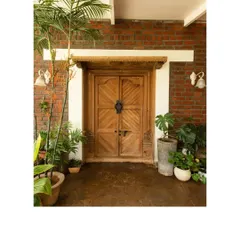 A beautiful repurposed door at The Brick Loft project. We believe in giving old materials a new life, and this vintage door adds a unique, rustic charm to the entrance.