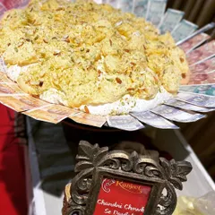 Another look at our Daulat Ki Chaat, a crowd favorite at festive events, showcasing its unique texture and elaborate presentation.