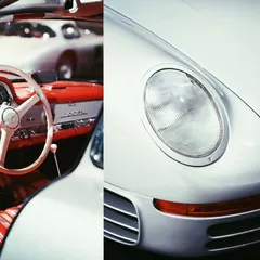 A study in classic car design. The vibrant red leather interior and steering wheel of a vintage Mercedes convertible next to the unmistakable headlight of another classic. These are the details that car lovers appreciate.