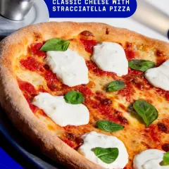 The Classic Cheese with Stracciatella. I elevate a simple margherita with dollops of creamy, fresh stracciatella cheese for a richer, more luxurious bite.