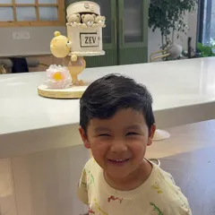 A happy moment with my son, Zev. Balancing work, family, and friends is what life is all about. These are the cherished moments that fuel my passion.