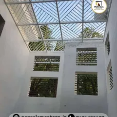 This skylight features a bold, geometric pattern, casting sharp, linear shadows on the walls below. It serves as a modern architectural element, bringing natural light into the home in a structured and artistic way.