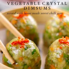 My Vegetable Crystal Dimsums are as beautiful as they are delicious. The translucent wrappers show off the colorful, finely chopped vegetables inside. I serve them with a homemade sweet chili jam for the perfect balance of flavors.