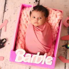 Another take on our popular 'Barbie' theme, this shot shows the full set with all the iconic accessories, creating a picture-perfect scene for your newborn girl.