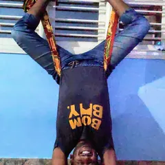 This is my happy place, hanging upside down. This supported Baddha Konasana in Sirsasana (Bound Angle Pose in Headstand) is deeply relaxing for the hips and lower back.