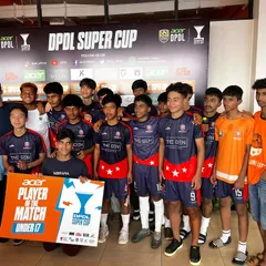The U17 team celebrates a Player of the Match award at the DPDL Super Cup, showcasing individual excellence within a team effort.