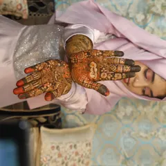Masha Allah, my pretty bride Taskeen on her wedding day. Her beautiful smile and the rich color of her henna say it all.