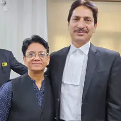 Pictured with a fellow advocate. Being part of a strong professional network is essential for staying current and effective in the legal field.