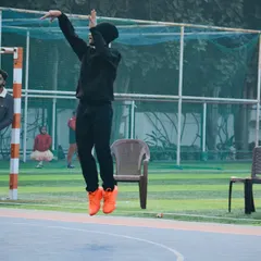 A jump shot captured during a practice session. The same discipline and focus required on a professional court are what I instill in my players every day.