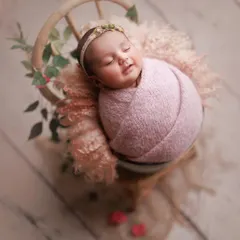 Doesn't she have a gorgeous smile? This six-week-old beauty gave us the sweetest expression during her session.
