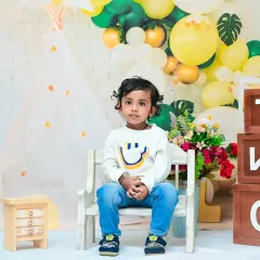 A thoughtful moment during a second birthday photoshoot. I capture a range of moods, not just the smiles, to provide a full picture of your toddler's personality.