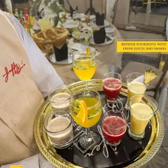Another look at the variety of fresh juices and shakes we offer, beautifully presented on a custom tray and served by our professional staff.