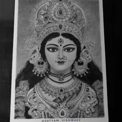 Another angle of the finished Maa Durga portrait, showing how the light catches the graphite. The level of detail in her crown and jewelry is something I take great pride in.