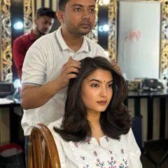 A close up of the blow dry curls demonstration. Notice the volume at the roots and the smooth finish on the ends, a technique we practice thoroughly in class.