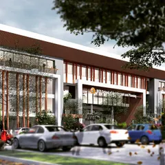 A perspective view of the proposed academic building, showing how the structure interacts with its surroundings. The design incorporates vertical louvers and deep-set windows to control sunlight while creating a rhythmic pattern across the exterior.
