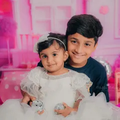 A sweet moment between brother and sister during her Barbie-themed birthday shoot. He was so gentle and proud to be in the photo with her.