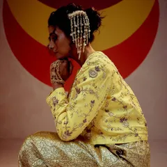 I love seeing my designs styled in unique ways. Here, our hair accessory is worn as a statement ear piece for a bold, contemporary look.