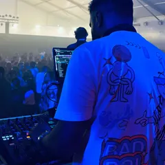 A view from my console at a large, tented event. The haze, the lights, and the packed crowd create an atmosphere that's perfect for an epic night of music.