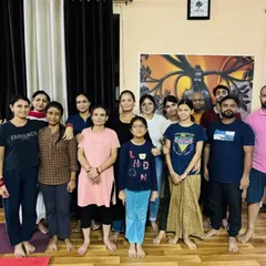 A group photo of our diverse community of students. Men, women, and children all practice together, creating a wonderful and inclusive environment.