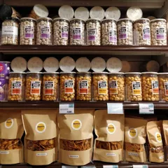 A close-up of my snacks stocked at a Food Hall store. Look for the Shanti's Kitchen label to find your favorite Murukkus and mixtures.