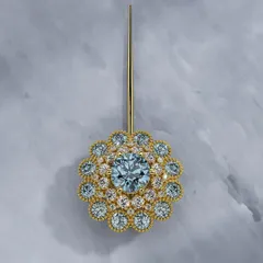 Your presence deserves a piece that rises to meet it. This floral-inspired pin, with its glowing aquamarine center and shimmering layers of diamonds, is crafted to highlight your grace and individuality.